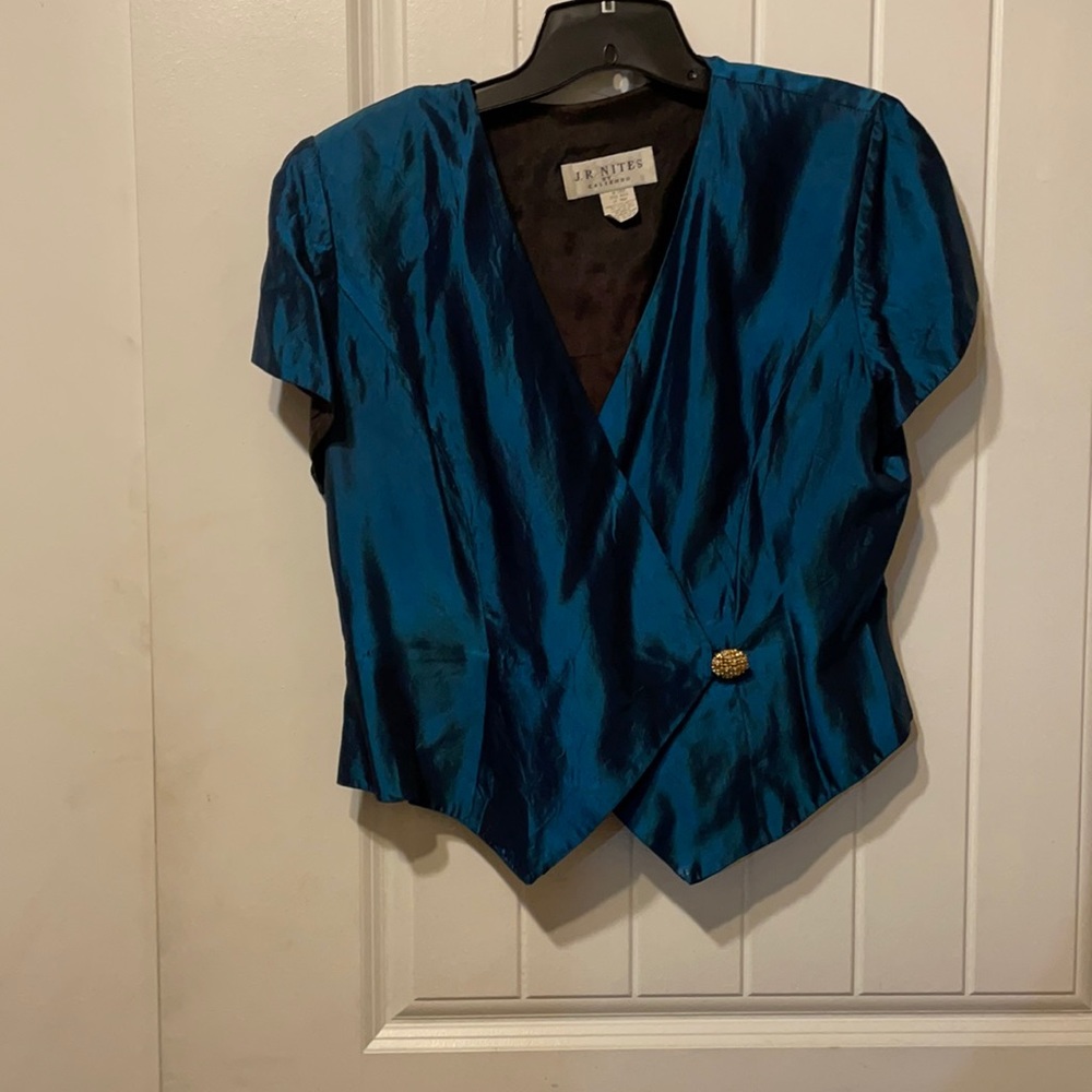 Fully lined teal formal top with accent button